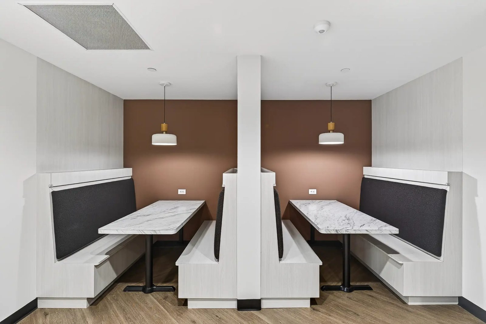 Commercial break-room build-out with custom seating booths