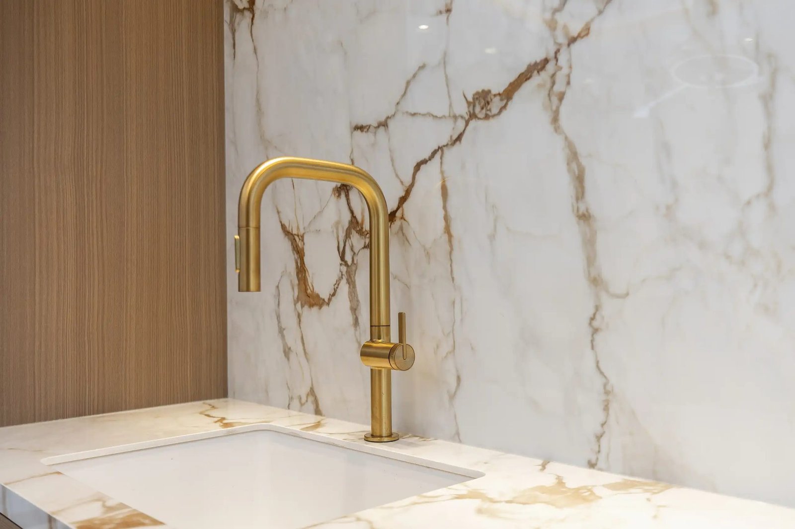 Marble and brushed-gold finish detail from a recent project
